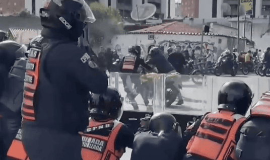 Police forces shoot at demonstrators in Venezuela in July 2024